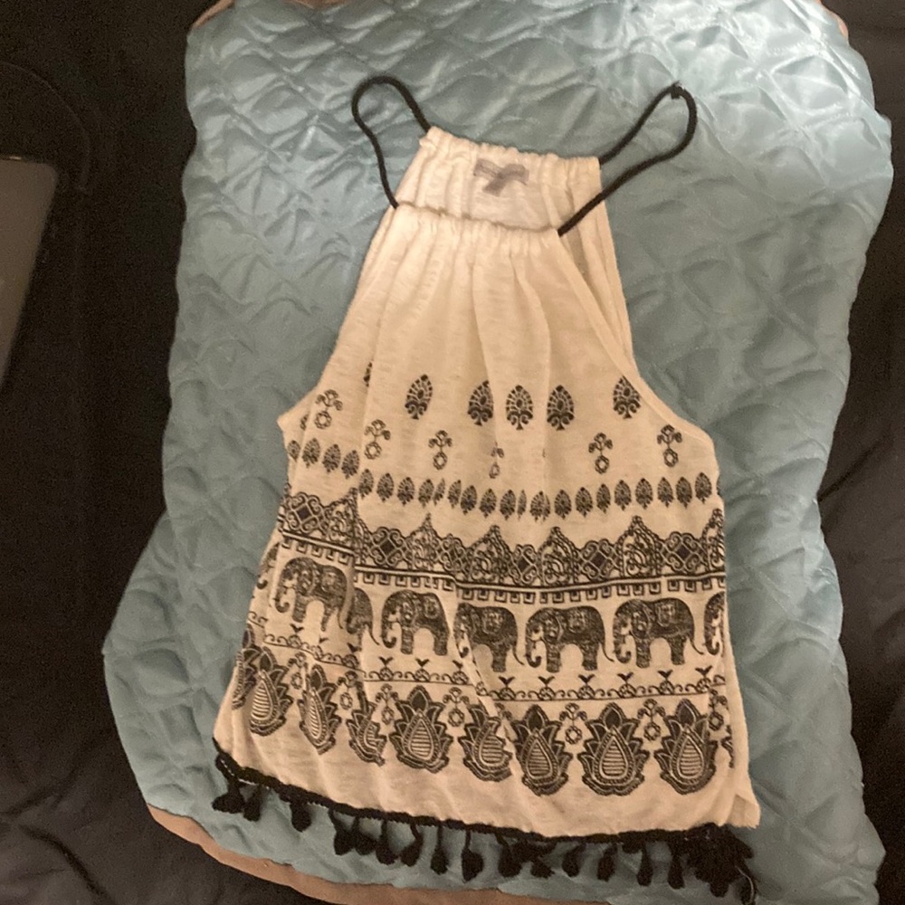 Cream colored tank top with elephant design